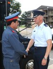 Col. William H. Mott V, 37th Training Wing commander, welcomes Maj. Gen. Mohammad Dawran, Afghan National Army Air Corps Commander, to Lackland May 21. (U.S. Air Force photo/Rich McFadden)