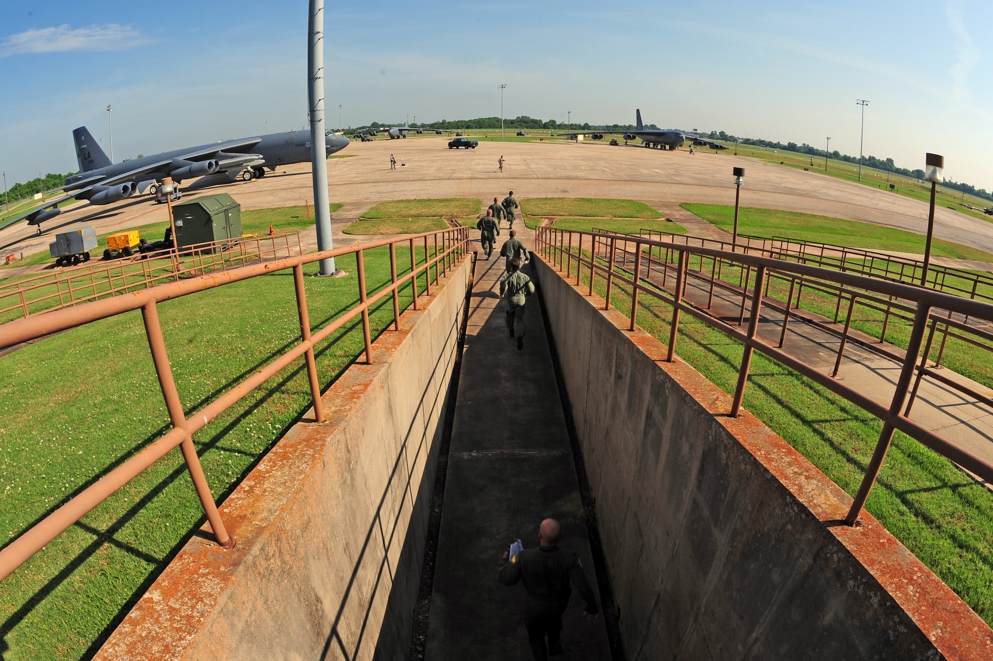 BARKSDALE AIR FORCE BASE, La. – Aircrew from the 96th Bomb Squadron run to a B-52H Stratofortress after the sounding of the Klaxon during a Nuclear Operational Readiness Exercise May 25. The Klaxon is a horn that emits an alert sound that was previously used as hand-powered warning system for military evacuation, and as a submarine dive alarm. This warning is currently used electronically on trains, ships and aircrew who are on alert and may need to take-off at a moment’s notice. (U.S. Air Force photo by Senior Airman Joanna M. Kresge)