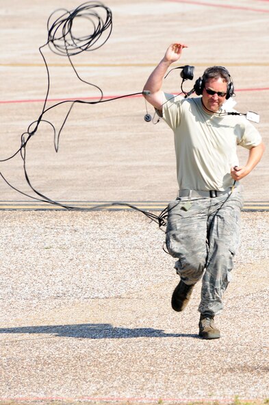 BARKSDALE AIR FORCE BASE, La. – Tech. Sgt. Marshall Spero, 2d Aircraft Maintenance Squadron crew chief, runs off the flight line in preparation for the launch of a B-52H Stratofortress during a Nuclear Operational Readiness Exercise May 25. This is Barksdale’s second NORE of three before a Nuclear Operational Readiness Inspection slated for late June. (U.S. Air Force photo by Senior Airman Joanna M. Kresge)