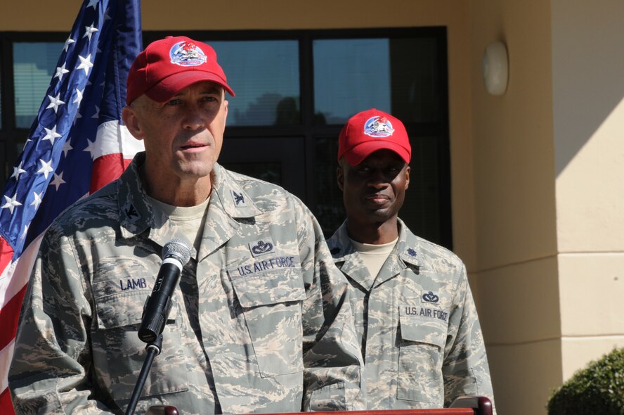 Col. Timothy Lamb, commander of the 567th RED HORSE Squadron, talks to his troops during a building dedication in March. Colonel Lamb ran 82 miles in late May to honor the memory of his wife, Beth. (USAF photo by TSgt. Scotty Sweatt, 916ARW/PA)