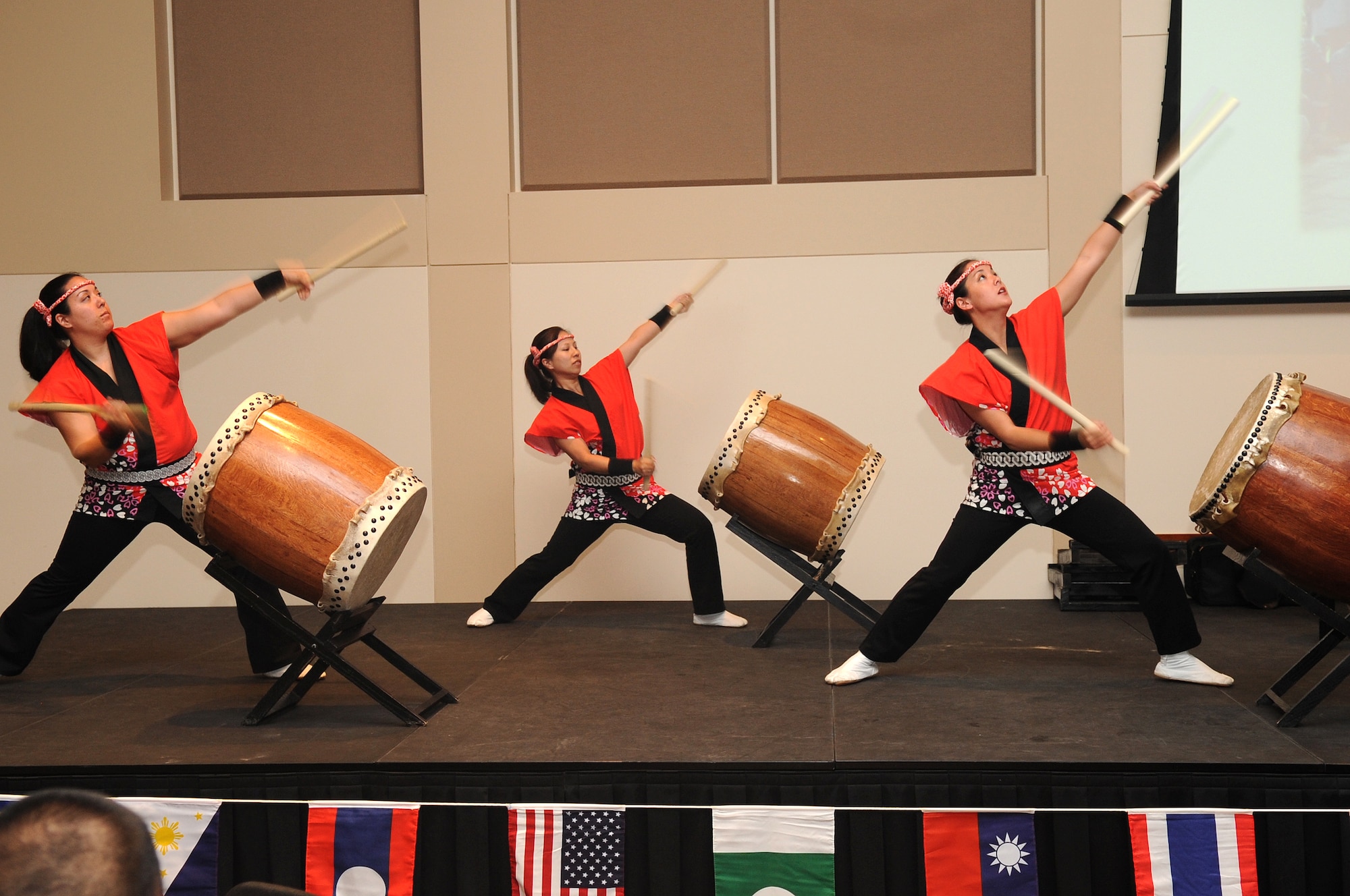 BUCKLEY AIR FORCE BASE, Colo. -- The Mirai Daiko all-female drumming group performs at the Asian Pacific Heritage food tasting May 26. The luncheon celebrated Asian-Americans' different cultures, history and traditions. (U.S. Air Force Photo by Airman 1st Class Manisha Vasquez)