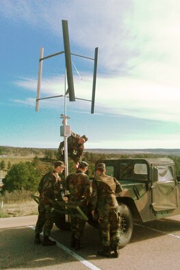 Cadets 1st Class Matt Ludwig, Robert Haward, Nick Bassett and Alex Frank conduct a system integration test of a wind turbine power system on a Humvee at the Air Force Academy April 28, 2010. Using a wind turbine may allow Humvee crews to operate electronic equipment without idling the vehicle's engine, thereby improving fuel efficiency. (U.S. Air Force photo/Cadet 1st Class John Arvett II)
