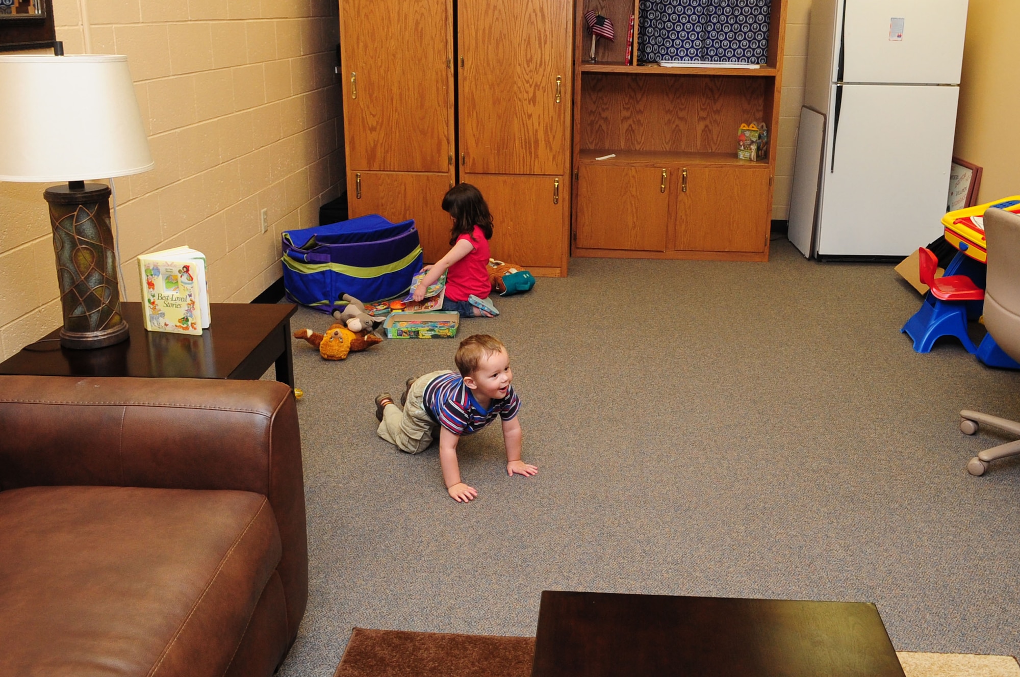 ELLSWORTH AIR FORCE BASE, S.D. - Children play inside the key spouse room located in the security forces building, May 24. The room has a play area for children and serves as a support network for 28 SFS spouses. (U.S. Air Force photo/Airman 1st Class Corey Hook)