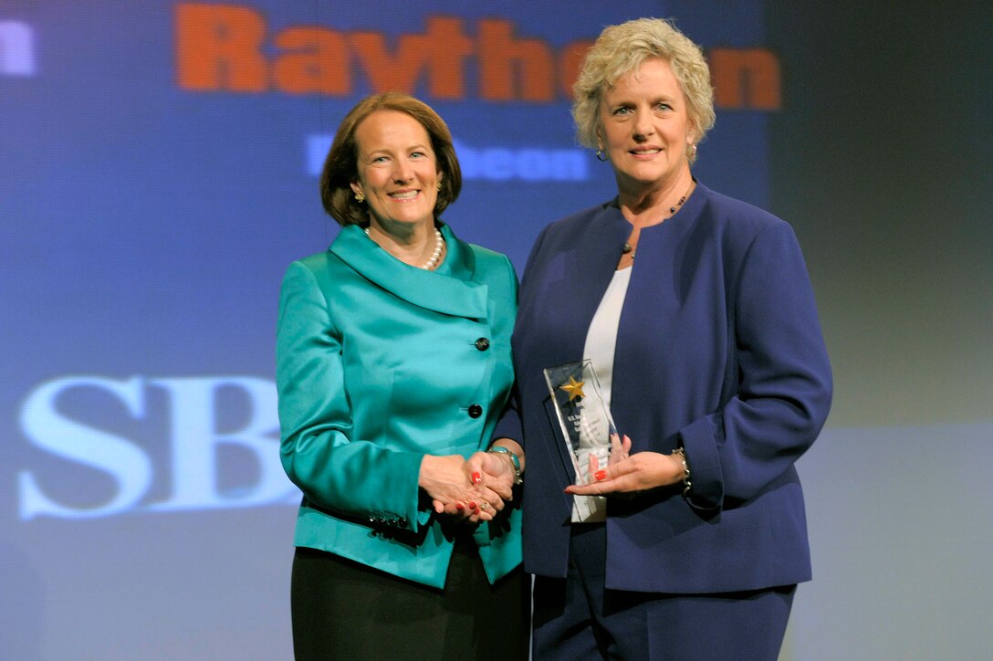Karen G. Mills (left) and Judith Croxton pose at the 2010 SBA National Small Business Week event May 25, 2010, in Washington, D.C. Ms. Mills is an administrator with the U.S. Small Business Administration. Ms. Croxton is the director of business operations at Shaw Air Force Base, S.C. (U.S. Air Force photo/Cable Risdon Photography)