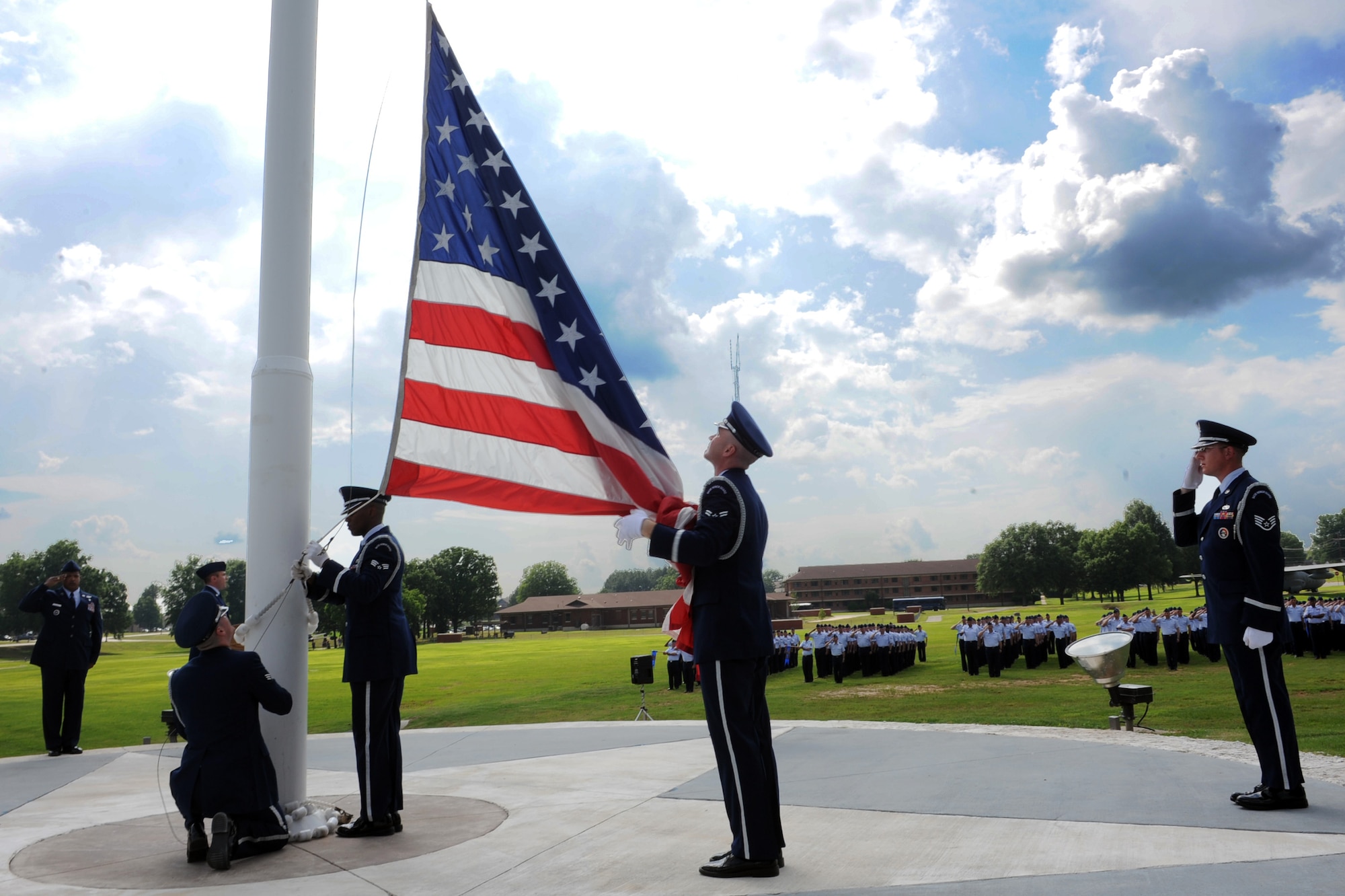 Little Rock Air Force Base Honor Guard Airmen lower the flag during the base’s Memorial Day retreat ceremony May 26. (U.S. Air Force photo by Senior Airman Ethan Morgan)