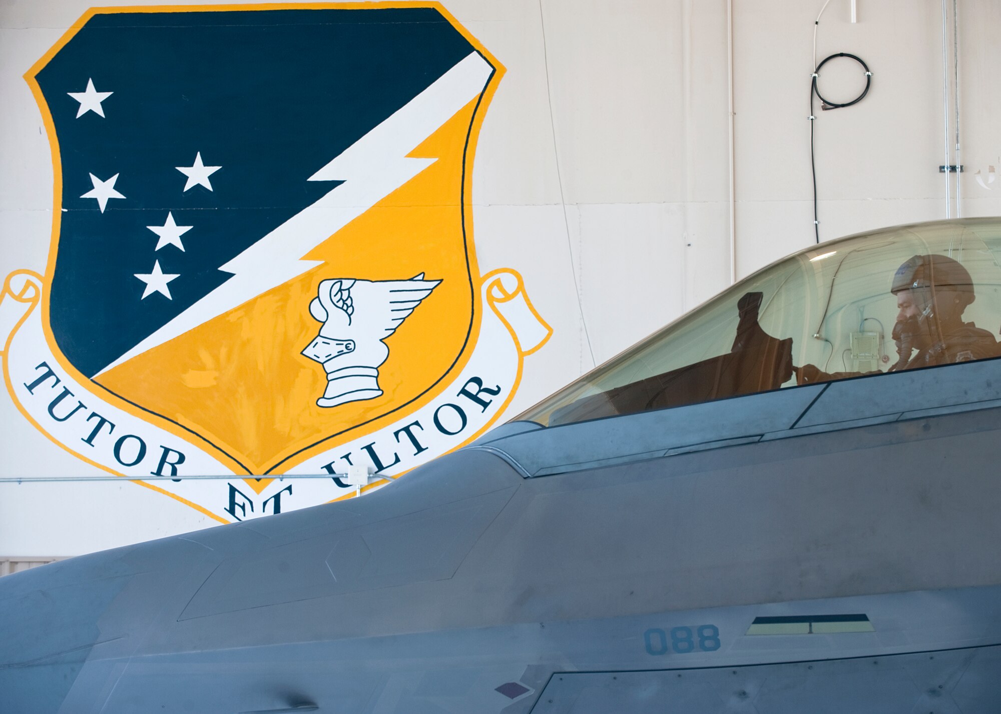 HOLLOMAN AIR FORCE BASE, N.M. -- Lt. Col. Robert Teschner, 7th Fighter Squadron commander, performs a pre-flight systems check of an F-22 Raptor to ensure it is properly functioning before takeoff May 24, 2010. F-22?s from Holloman deployed to Kadena Air Base, Japan, for approximately four months as part of a U.S. Pacific Command Theater Security Package. (U.S. Air Force photo by Senior Airman DeAndre Curtiss / Released)