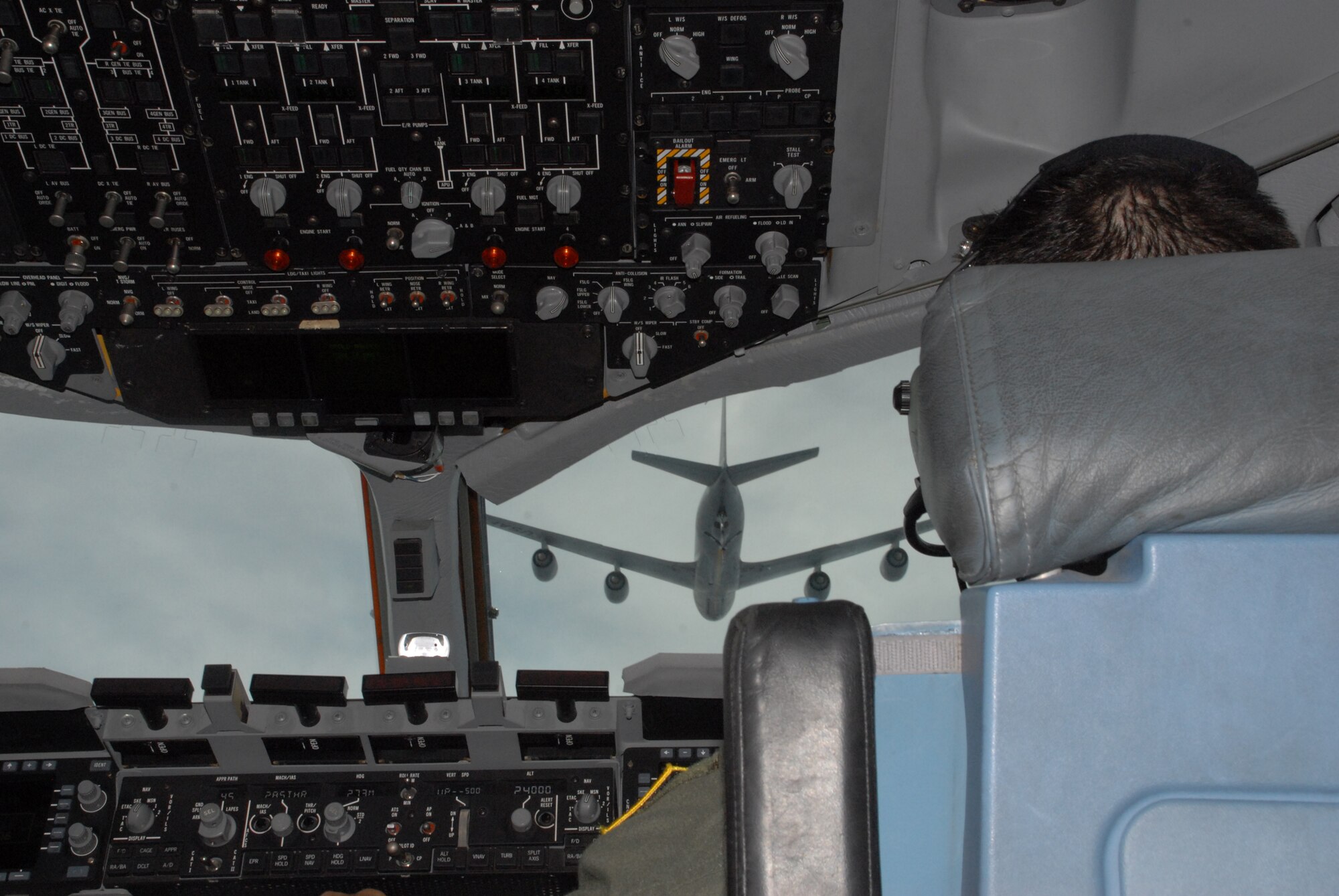 Capt Patrick McClintock, 3rd Airlift Squadron instructor pilot, prepares for an air refueling procedure during the Mobility Air Forces Exercise May 20. MAFEX is an exercise performed twice a year and is planned by weapons school students before their graduation. New tactics are tested in this training environment to prepare for real world deployments. (U.S Air Force photo/2d Lt. Jennifer Guerrero)