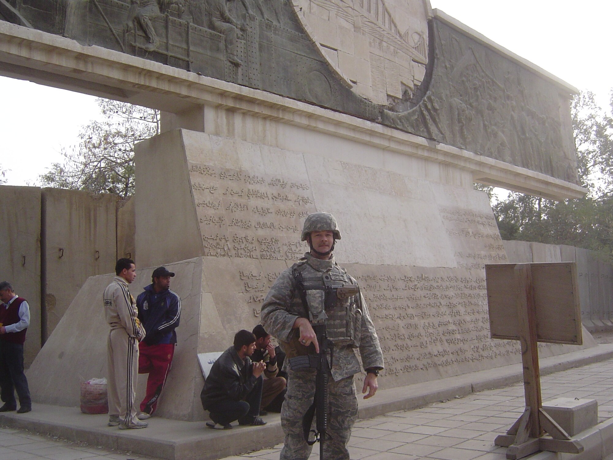 Lt. Col. Charles Henderson, Air Mobility Command Test and Evaluation
Squadron commander, recipient of the Bronze Star, poses near Iraqi monument
while deployed in Baghdad, Iraq from Sept. 20, 2009 to Mar. 31, 2010.  (Courtesy Photo)
