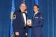 McGHEE TYSON AIR NATIONAL GUARD BASE, Tenn. -- Senior Airman Caressa M. Gibson, 175th Wing, Maryland Air National Guard, right, receives the Paul H. Lankford leadership award for Airman Leadership School Class 10-3 at The I.G. Brown Air National Guard Training and Education Center here from Senior Master Sgt. Terrence Krips, EPME Director of Resources, May 20, 2010. The leadership award is presented to the student who made the most significant contribution to the overall success of the class by demonstrating superior leadership abilities and excellent skills as a team member.  It is named in honor of CMSgt Paul H. Lankford, a Bataan Death March survivor and the first commandant of the Air National Guard Enlisted Professional Military Education Center.  (U.S. Air Force photo by Master Sgt. Kurt Skoglund/Released)