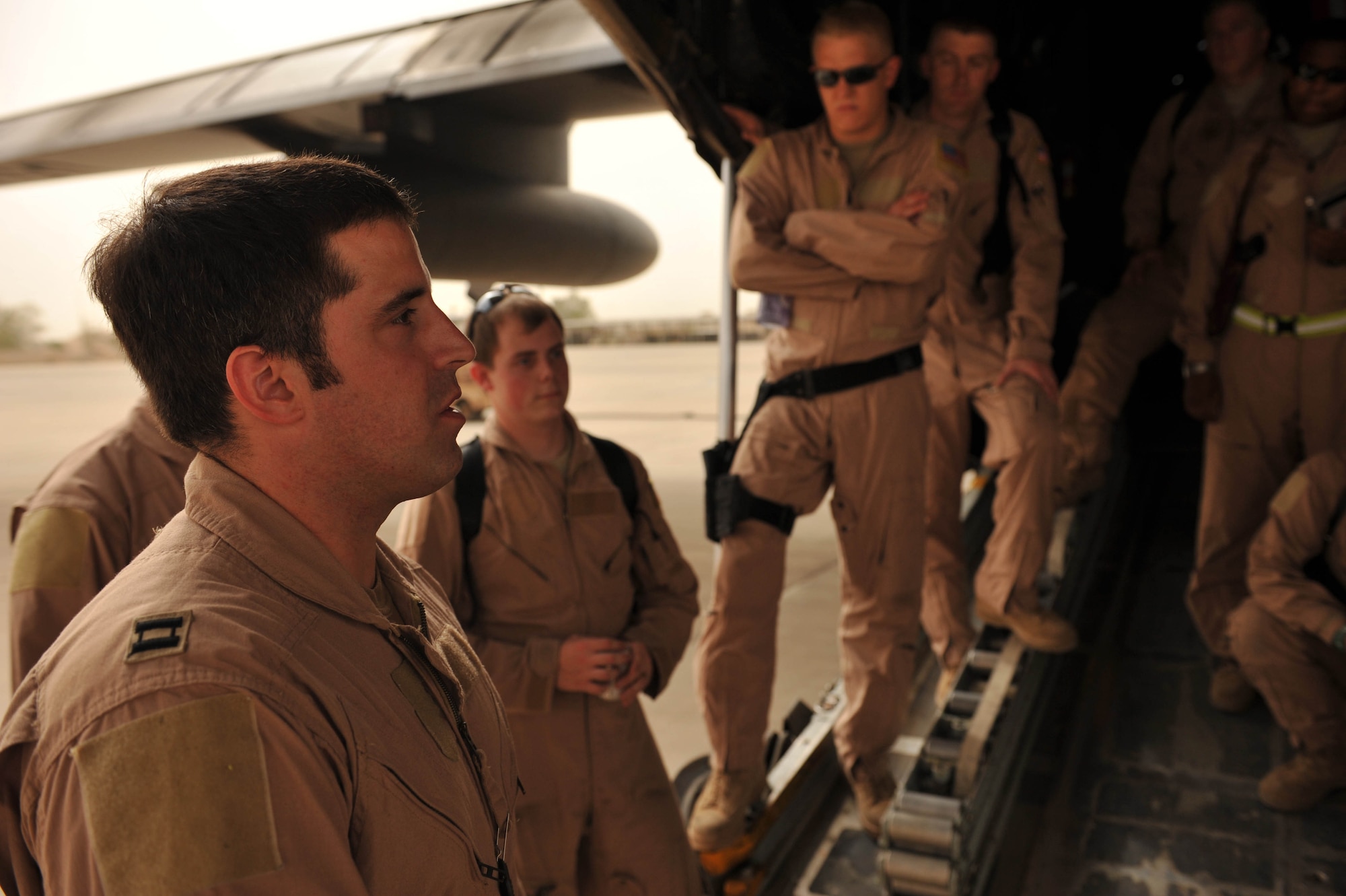 U.S. Air Force pilot, Capt. Brandon Roth, briefs his crew before takeoff at Joint Base Balad, Iraq, May 13, 2010.  Captain Roth is deployed to the 777th  Expeditionary Airlift Squadron, Joint Base Balad, Iraq.  (U.S. Air Force photo/Staff Sgt Quinton Russ/released)