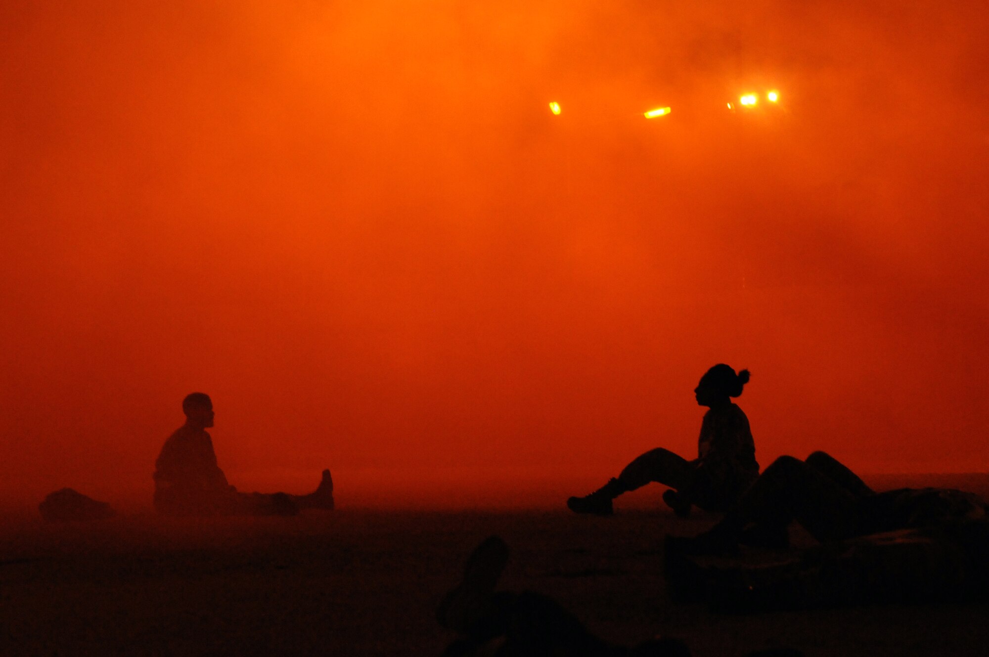 “Victims” wait for help to arrive following a simulated chemical attack during an anti-terrorism exercise Tuesday, May 26, 2010 at Incirlik Air Base’s Patriot Village.  The exercise tested the base’s terrorism-response ability.  The base was put into 24-hour operations for the duration of the exercise and accomplished a number of simulated artillery and chemical attacks.  (U.S. Air Force photo/Staff Sgt. Raymond Hoy)