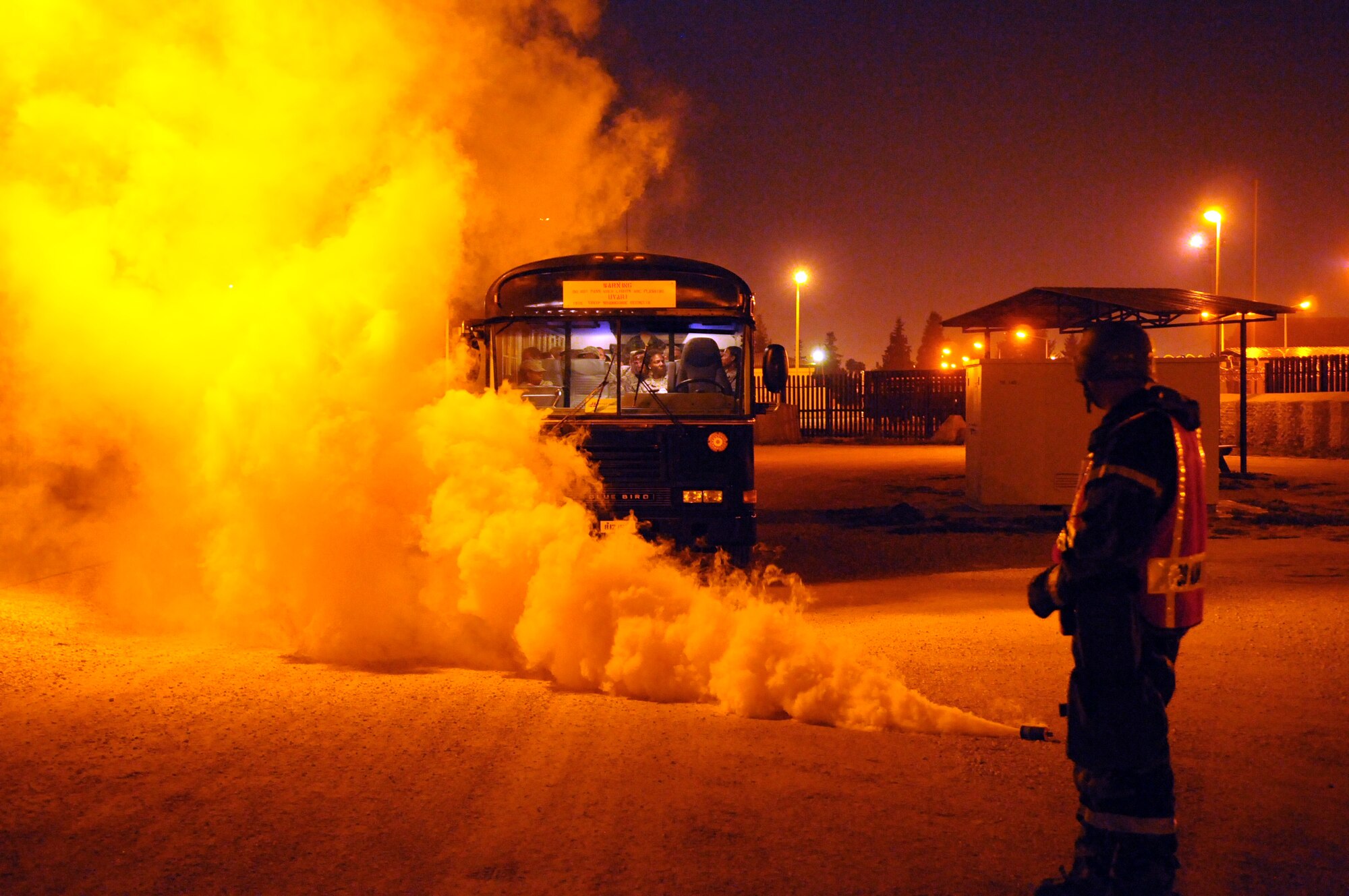 Airman 1st Class Daniel Coronado, 39th Security Forces Squadron, checks on a “victim” of a simulated chemical attack during an anti-terrorism exercise Tuesday, May 25, 2010 at Incirlik Air Base’s fitness center.  The exercise tested the base’s terrorism-response ability.  The base was put into 24-hour operations for the duration of the exercise and accomplished a number of simulated artillery and chemical attacks.  (U.S. Air Force photo/Staff Sgt. Raymond Hoy)