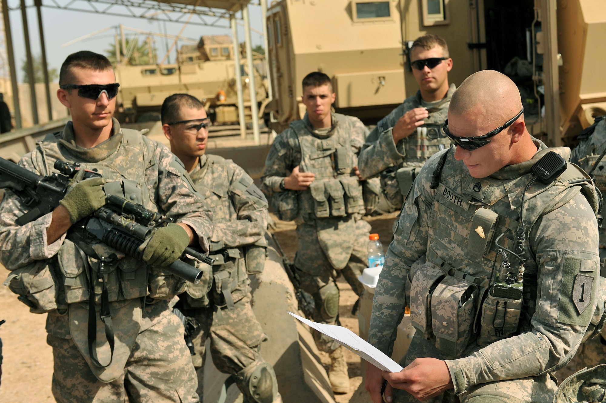 U.S. Army Staff Sgt. Jason Booth briefs Army and Air Force personel before a mission at Joint Base Balad, May 7, 2010.  Sergeant Booth is assigned to 1st Battalion, 28th Infantry, Delta Company Black Lions, 3rd Platoon, Ft. Riley, Kan.  (U.S. Air Force photo/Staff Sgt Quinton Russ/released)
