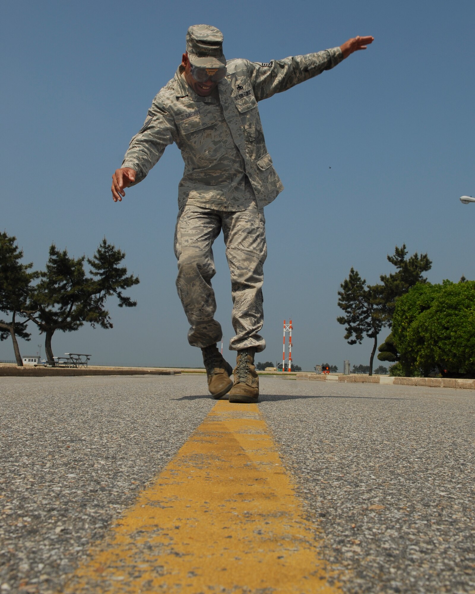 KUNSAN AIR BASE, Republic of Korea--Master Sgt. William Carson, 8th Fighter Wing flight safety non-commissioned officer tested goggles that simulate varying percentages of blood alcohol content levels. People will be asked to drive a golf cart in a restricted area while wearing these goggles. The purpose of this is to simulate the impairment caused by alcohol and its effects while driving. (U.S. Air Force Photo/Senior Airman Roy Lynch)