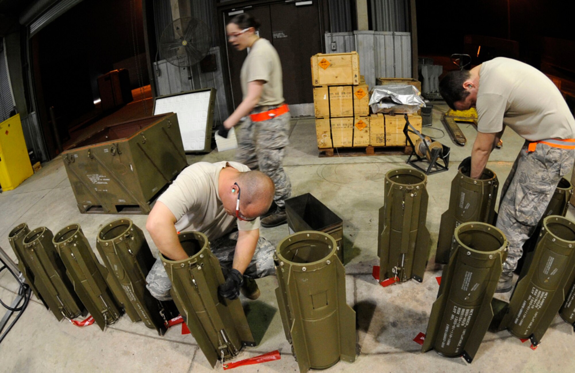 Staff Sergeants Brandon Jones and Wesley Cummins prepare BSU-49 fin kits before installing them on bomb bodies during the Combat Ammunitions Production Exercise at Osan Air Base, Republic of Korea, May 25. Sergeants Jones and Cummins are munitions maintainer from Osan's 51st Munitions Squadron. CAPEX is a non-rated exercise held once a year in the Pacific Air Force region. (U.S. Air Force photo/Staff Sgt. Stephenie Wade)
