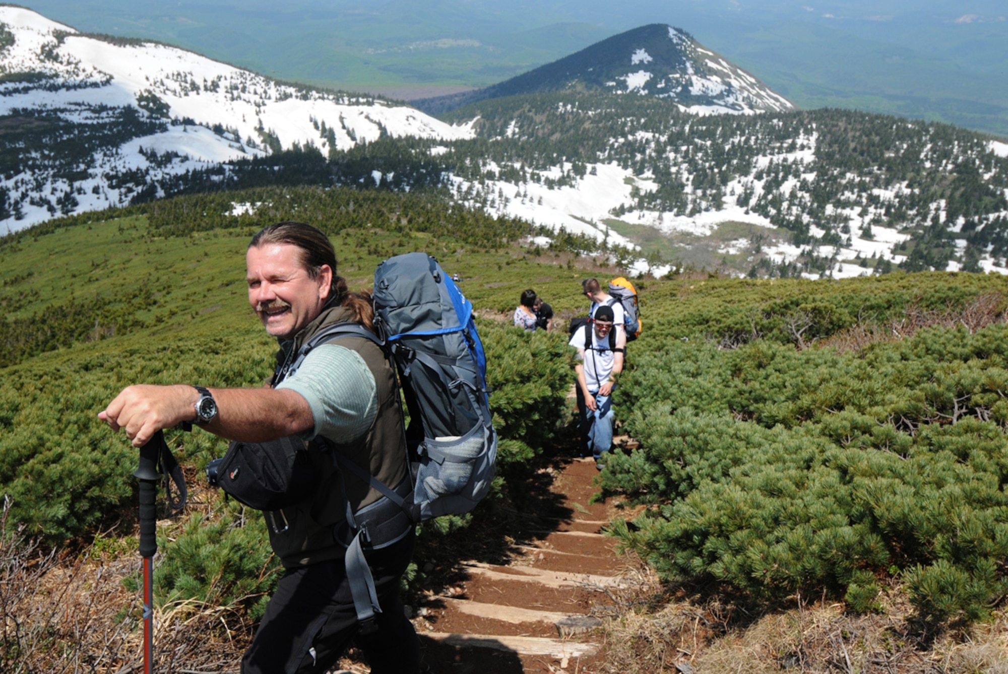Ronald Stark, 35th Force Support Squadron Outdoor Recreation program coordinator, leads a group of Airmen to the summit along northern Japan’s Hakkoda mountain range May 22 during a Pacific Air Forces Command’s Ultimate Airman Adventure trip. The UAA introduces Misawa Air Base’s first-term Airmen to a variety of outdoor recreational activities at little or no costs throughout the peak summer months. (U.S. Air Force photo/Senior Airman Jessica Lockoski) 