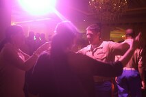 FARMINGDALE, N.J.  - A Marine with Special Marine Air Ground Task Force New York dances at a dinner party held as part of the Eagle Oaks Golf and Country Club Honor Day in Farmingdale, N.J., May 27. The annual Fleet Week event brought some 200 Marines and Sailors to the club for a day of golf and relaxation. More than 3,000 Marines, Sailors and Coast Guardsmen will be in the area participating in community outreach events and equipment demonstrations. This is the 26th year New York City has hosted the sea services for Fleet Week.::n::(Official Marine Corps Photo by Lance Cpl. Jad Sleiman)