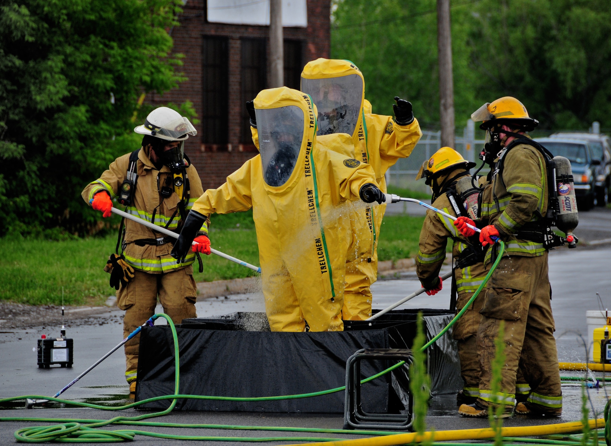 The Niagara Falls Air Reserve Station Fire Department lends support during a hazardous material spill at a chemical plant on Buffalo Ave., May 28, 2010, Niagara Falls, NY. The Niagara Falls Air Reserve Station Fire Department is one of the most current, qualified and trained for hazardous material calls in the Niagara Falls area. (U.S. Air Force photo by Staff Sgt. Joseph McKee)