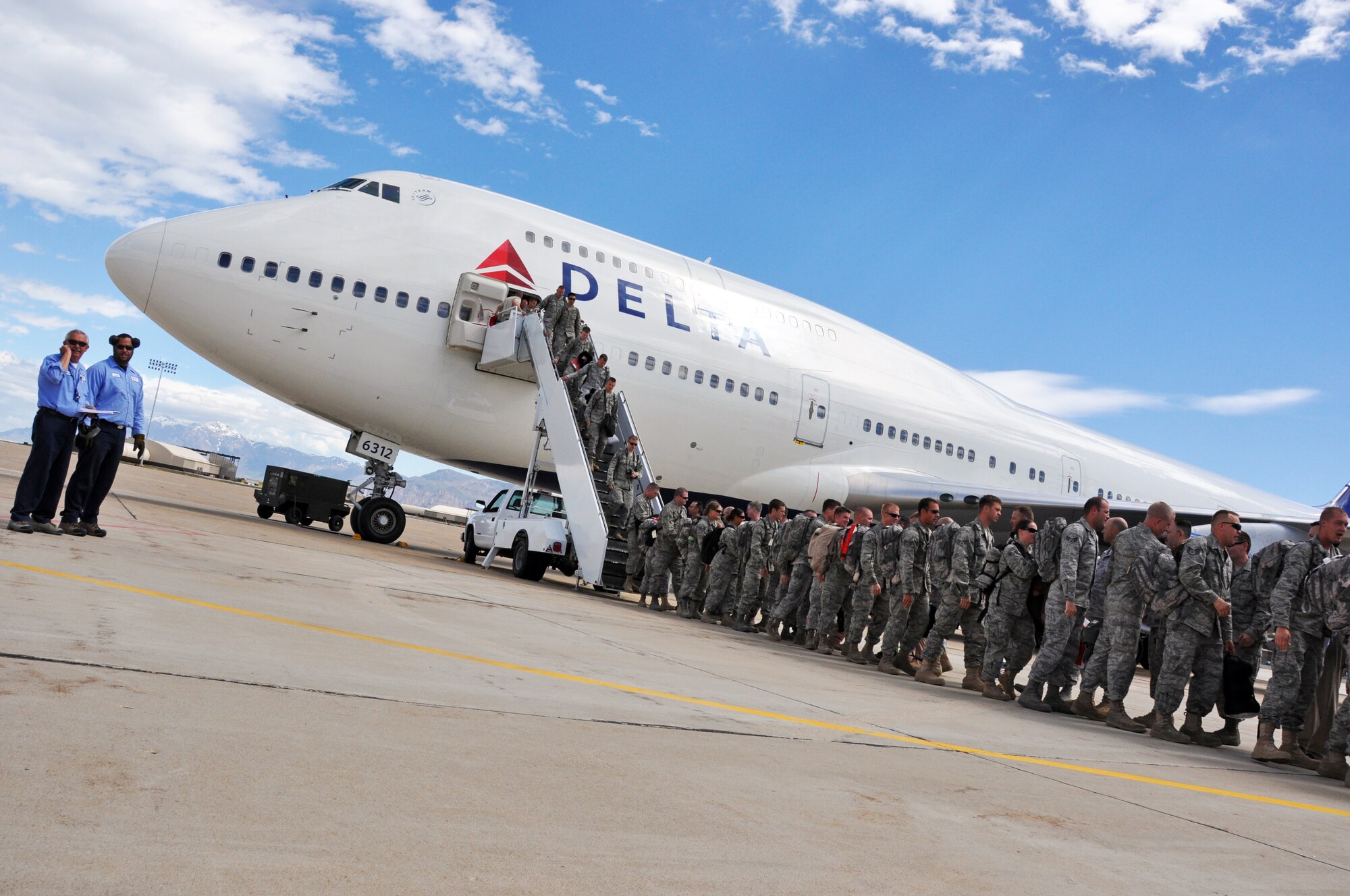 Airmen returning from a nearly five-month deployment to Afghanistan arrive on the flightline of Hill Air Force Base May 28. (U.S. Air Force photo/Bryan Magaña)