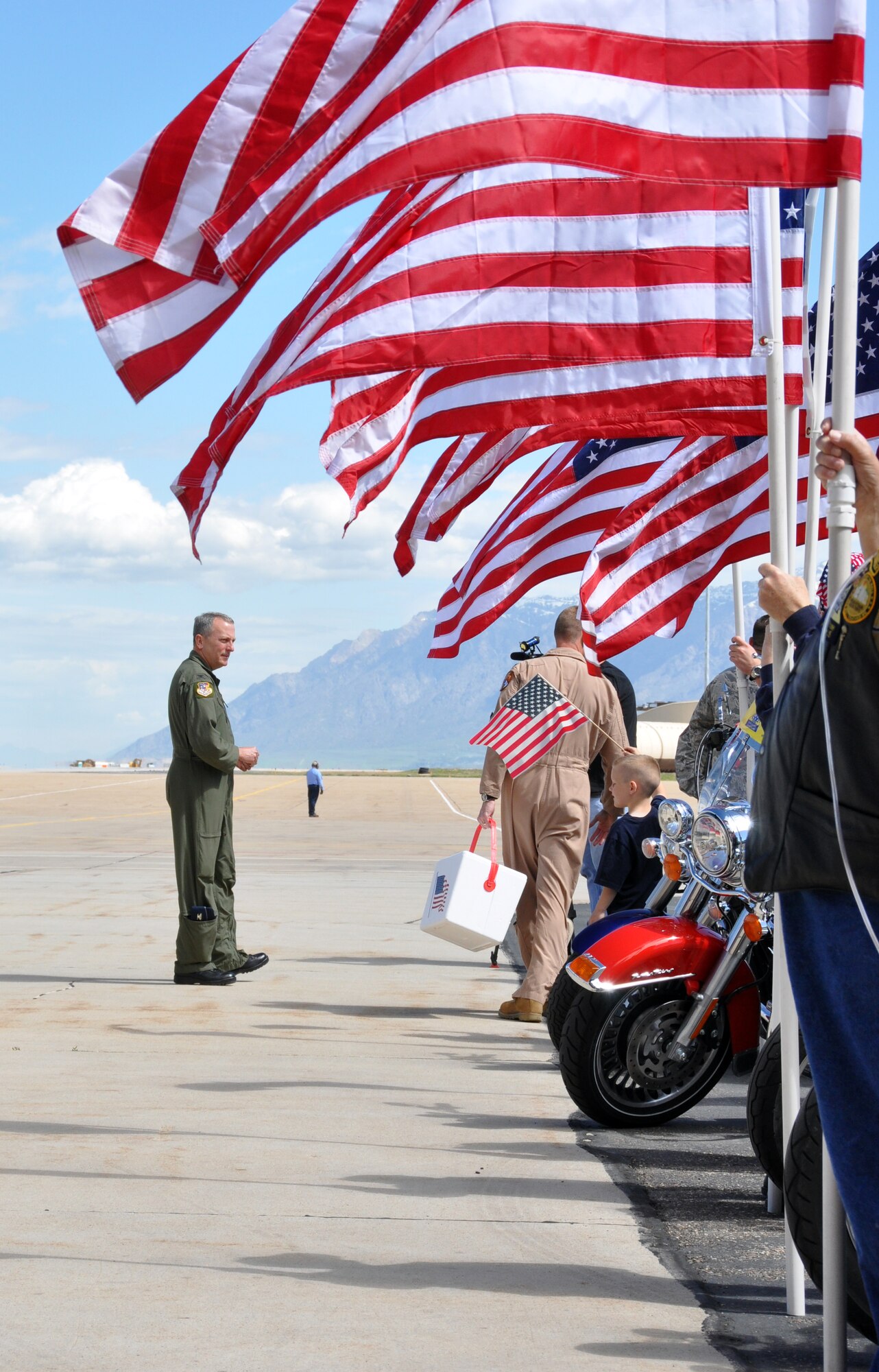 Col. Walter “Buck” Sams, 419th Fighter Wing commander, awaits arrival of the jet that will bring back about 300 Airmen from the 419th and 388th Fighter Wings. (U.S. Air Force photo/Bryan Magaña)