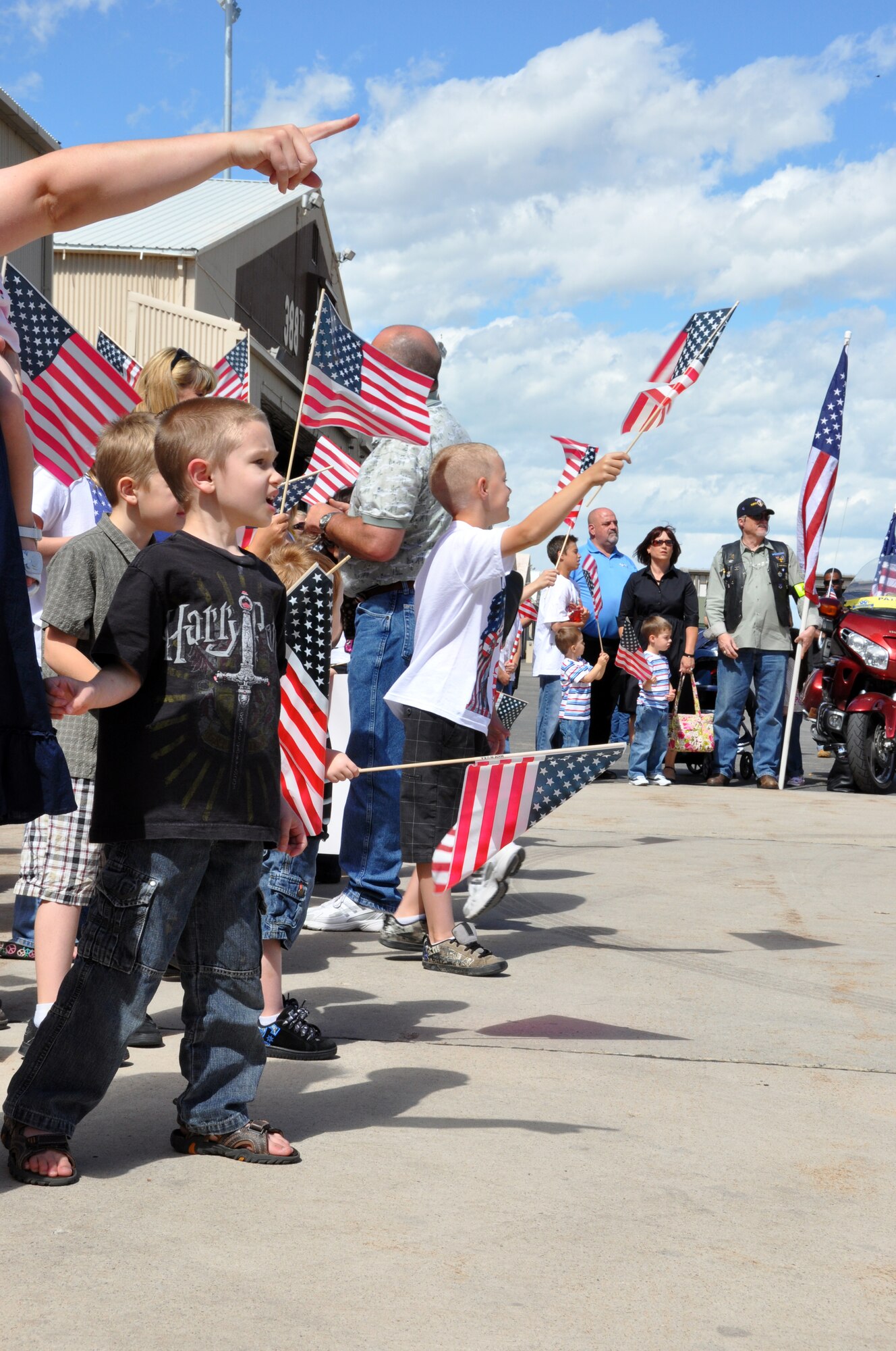 Eager children await the arrival of the parents and loved ones, some 300 Airmen from the 419th and 388th Fighter Wings who returned to Hill Air Force Base from Afghanistan May 28. (U.S. Air Force photo/Bryan Magaña)