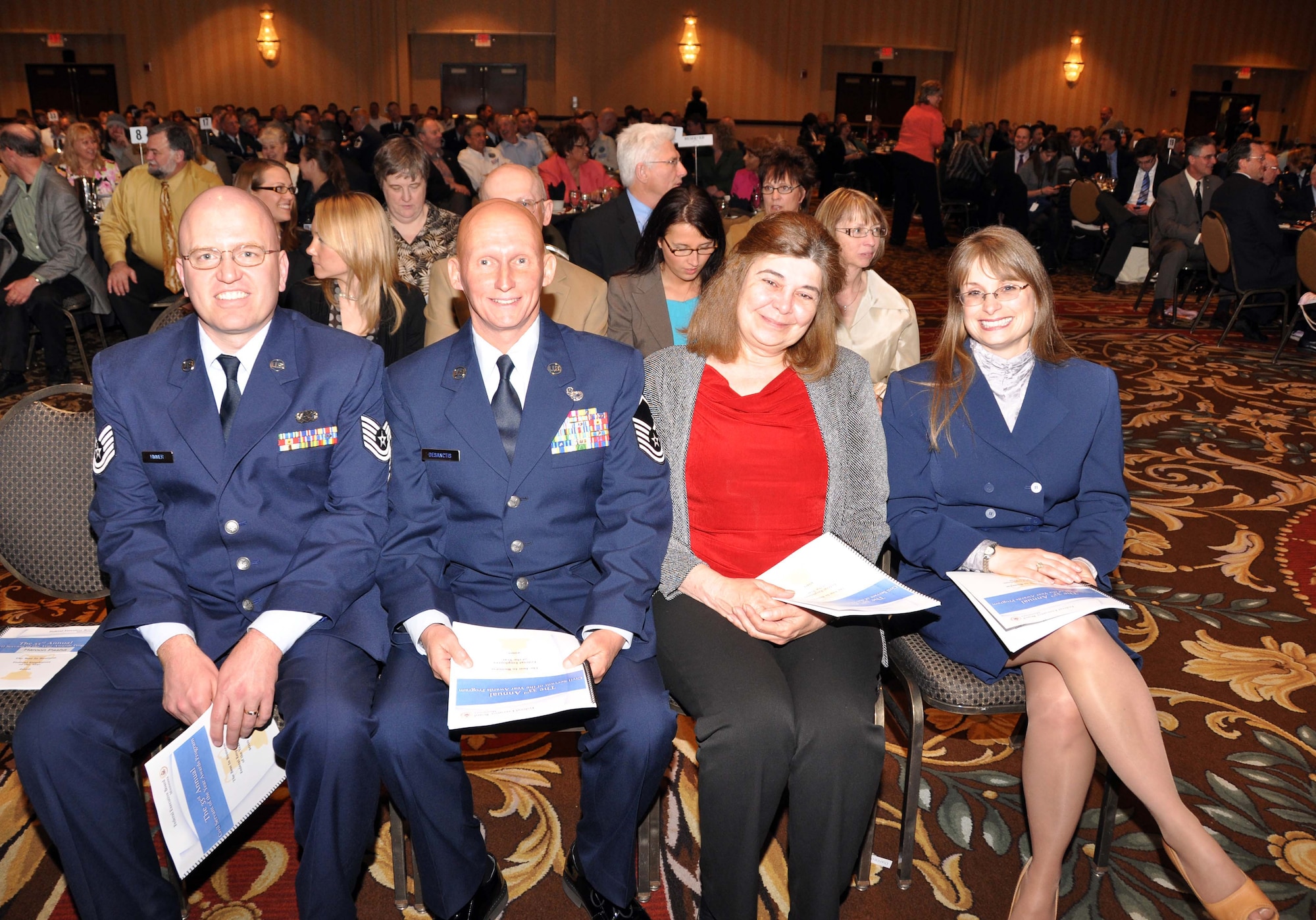 934th Airlift Wing Civil Servant?s of the Year are honored at the Federal Executive Board awards ceremony May 7.  From left are Tech. Sgt. Mark Himmer, adminstrative; Master Sgt. Pete DeSanctis, skilled trades; Darcee Copus-Sabart, professional; and Kristin Borntrager, leadership.   The annual awards are presented to outstanding employees in all federal agencies in Minnesota. (Air Force Photo/Paul Zadach)