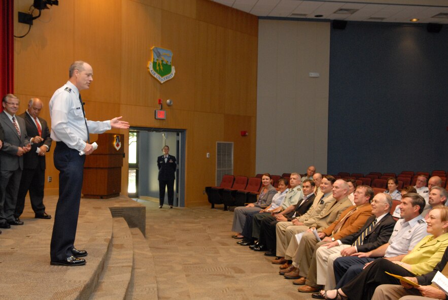 Air University commander Lt. Gen. Allen Peck spoke to this year’s Blue Dart Award winners at an award presentation May 24. The annual awards are given out to Air War College students and faculty for their opposite-the-editorial-page writings. (U.S. Air Force/Bennett Rock)