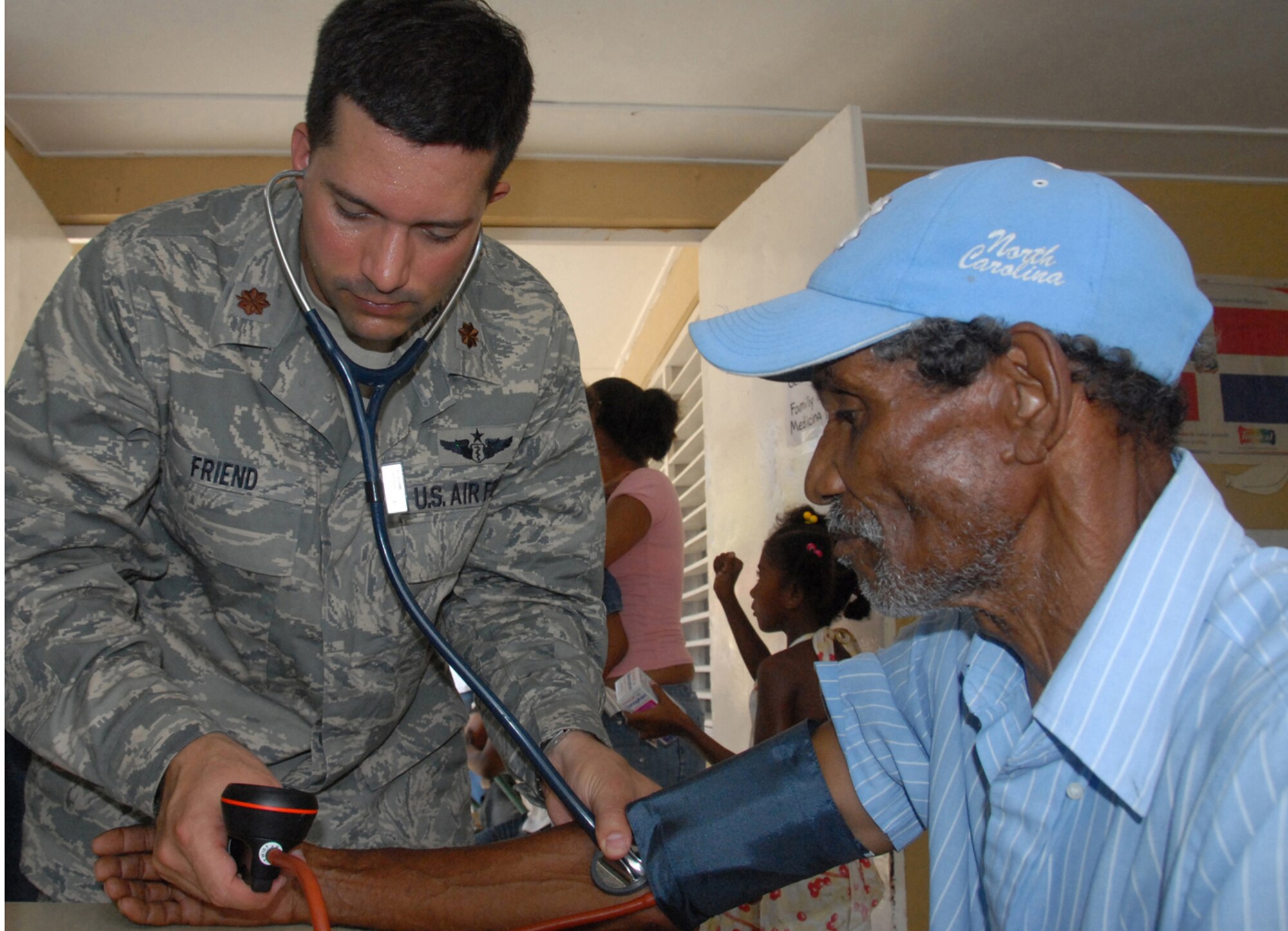 Maj. (Dr.) Rodney Friend, a physician with the 927th Aeromedical Staging Squadron, MacDill Air Force Base, Fla., checks a Dominican patient's blood pressure during MEDRETE 2010 Dominican Republic on May 24, 2010. A team of 39 medical specialists from Air Force Reserve Command is providing medical care to four towns in the Puerto Plata region of the country. (U.S. Air Force photo/Master Sgt. Chance C. Babin)