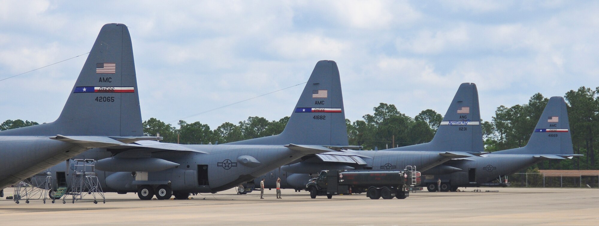 The Air Mobility Command's first-ever homeland security/homeland defense Operational Readiness Inspection tested three units' warfighting capabilities on U.S. soil by evaluating their response to a series of terrorist attacks while maintaining airlift operations. The exercise was a Total Force effort, with the Kentucky Air National Guard's 123rd Airlift Wing serving as the lead unit, the active-duty Air Force's 317th Airlift Group providing aviation assets, and the Air Force Reserve's 70th Aerial Port Squadron delivering cargo-handling capabilities. (U.S. Air Force photo/Tech. Sgt. Dennis Flora) (Released)