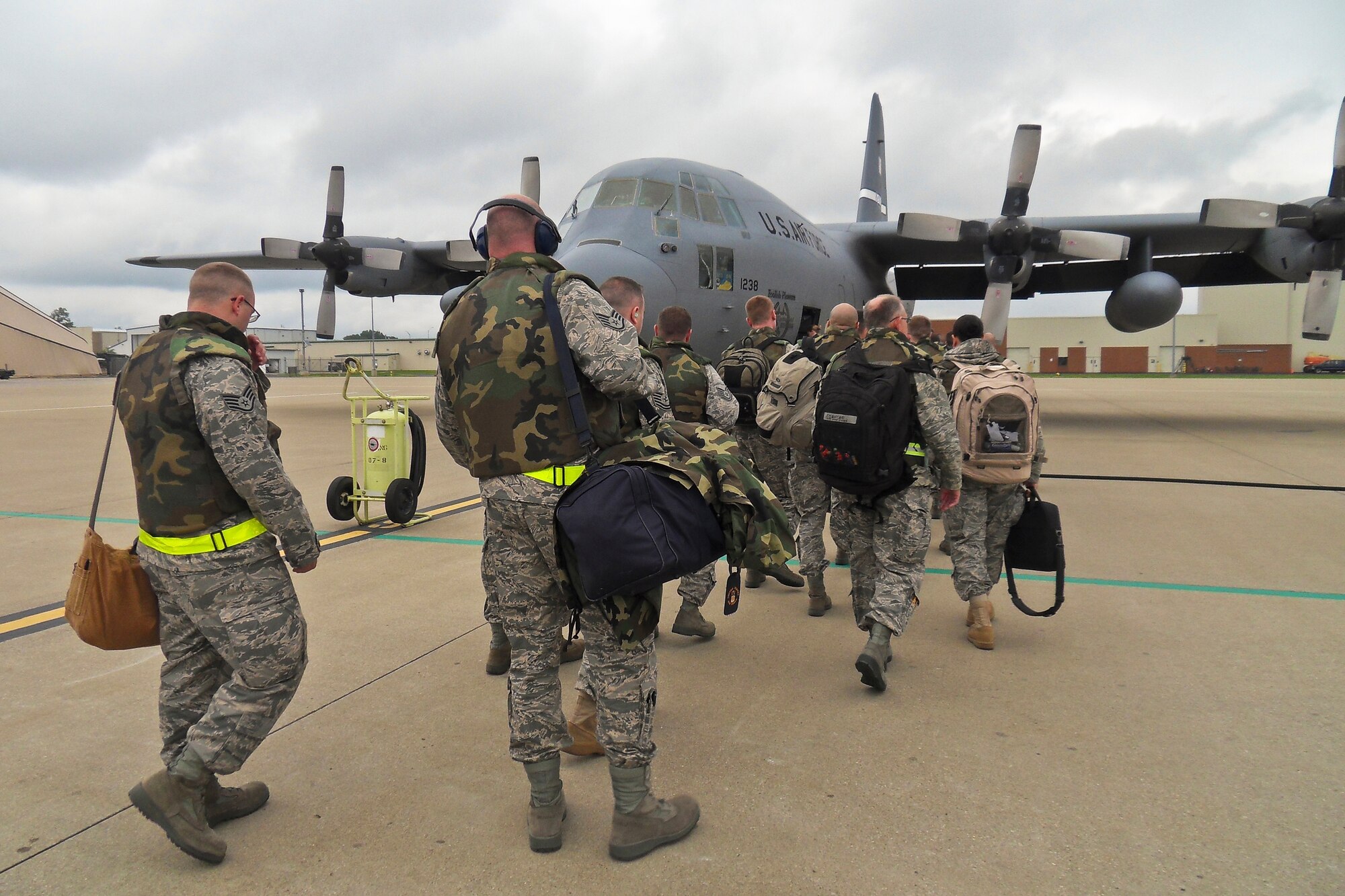 Members of the 123rd Airlift Wing depart the Kentucky Air National Guard Base in Louisville, Ky., on May 18, 2010 en route to Gulfport, Miss., for an Air Mobility Command Operational Readiness Inspection. The ORI was the first ever to test a unit's capabilities in defense of the homeland. (U.S. Air Force photo/Tech. Sgt. Dennis Flora)(Released)(U.S. Air Force photo/Tech. Sgt. Dennis Flora)(Released)