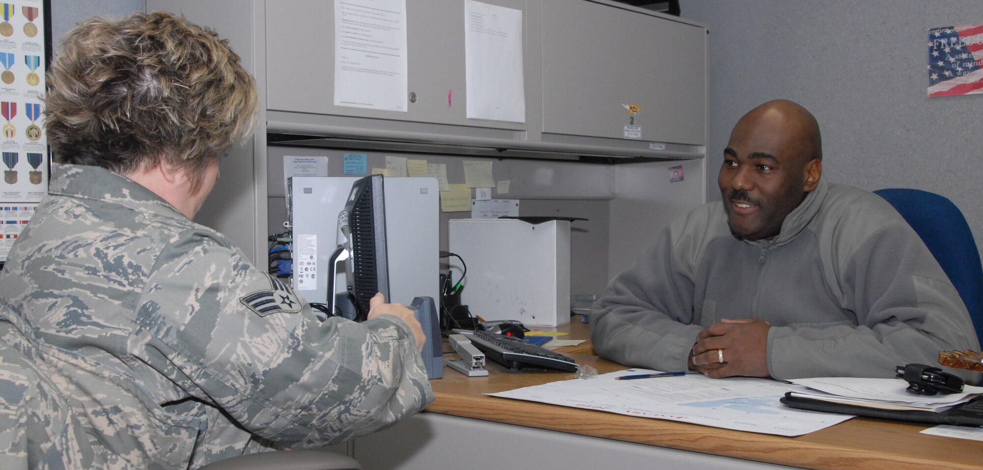 1st Sgt. Donald Butler talks with Senior Airman Sherry Brainard during the February unit training assembly. Sergeant Butler became the 442nd Fighter Wing first sergeant in October 2009. The 442nd Fighter Wing is an Air Force Reserve unit at Whiteman Air Force Base, Mo. (U.S. Air Force photo/Staff Sgt. Kent Kagarise)