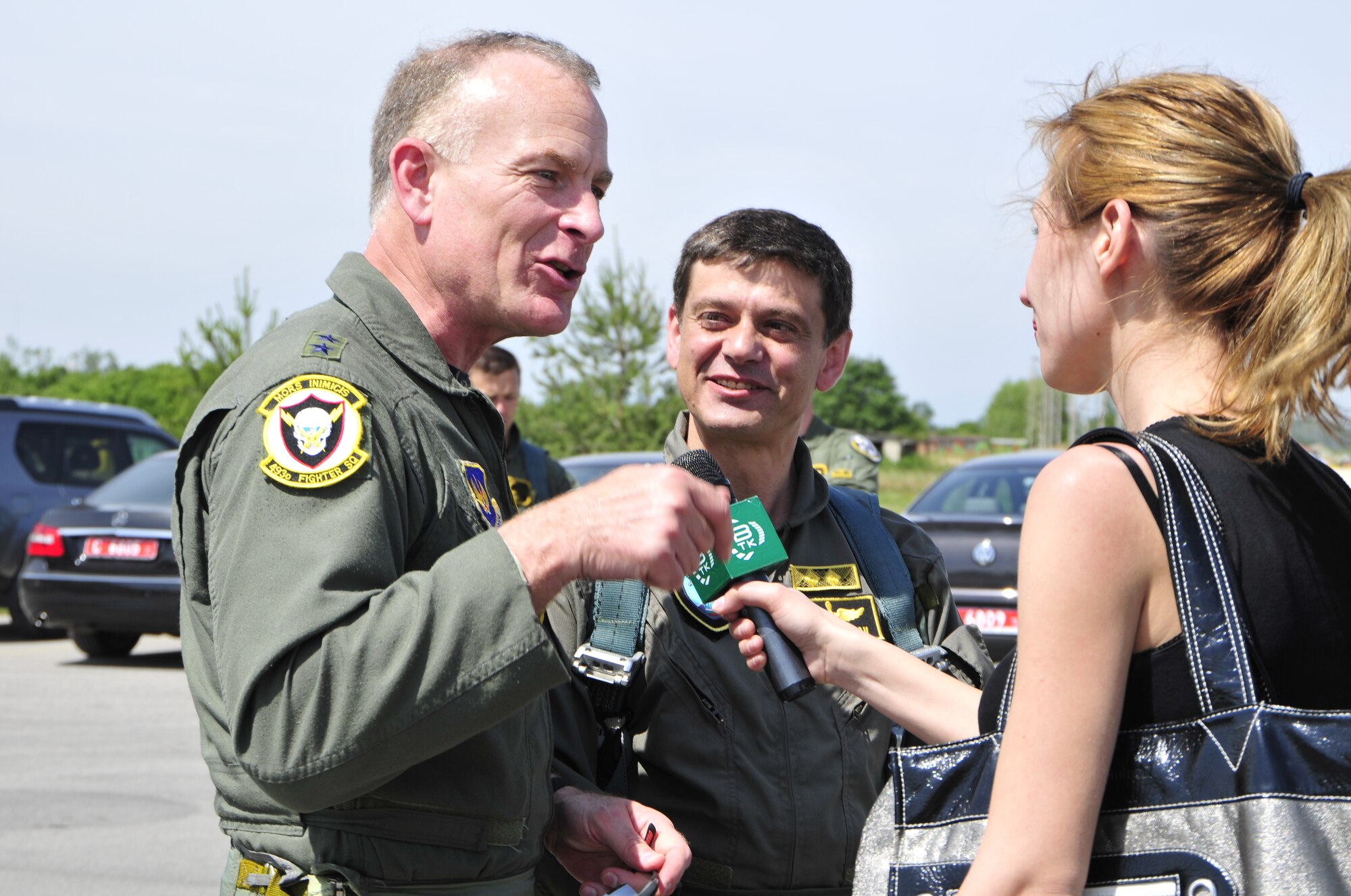 Maj. Gen. Jack Egginton (left), U.S. Air Forces in Europe director of air and space operations, and Bulgarian air force Maj. Gen. Konstantin Popov, chief of air force training headquarters, conduct an interview with Bulgarian media at Graf Ignatievo Air Force Base, Bulgaria, to mark the end of a successful joint-exercise. Sentry Gold was held to build partnerships between the two air forces and continue Bulgaria’s integration into NATO. (U.S. Air Force photo/Airman 1st Class Tiffany M. Deuel)