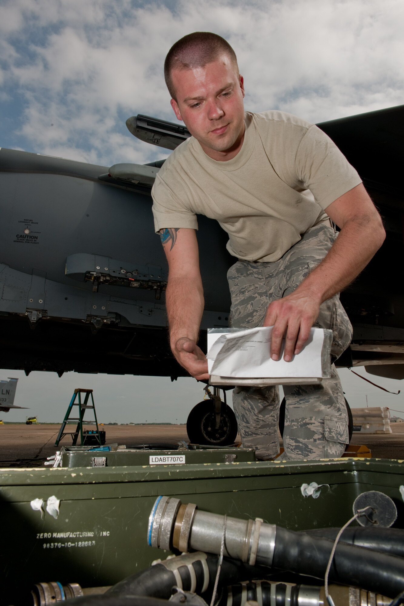 Airman 1st Class David Hocker, 48th Aircraft Maintenance Squadron weapons team member, accounts for all of his equipment before finishing up a 30 and 60 day inspection on an F-15 at RAF Mildenhall, England, May 25. The maintenance squadron is working out of RAF Mildenhall temporarily while their home runway at RAF Lakenheath, England, is being repaired. (U.S. Air Force photo/Tech. Sgt. Nathan Gallahan)