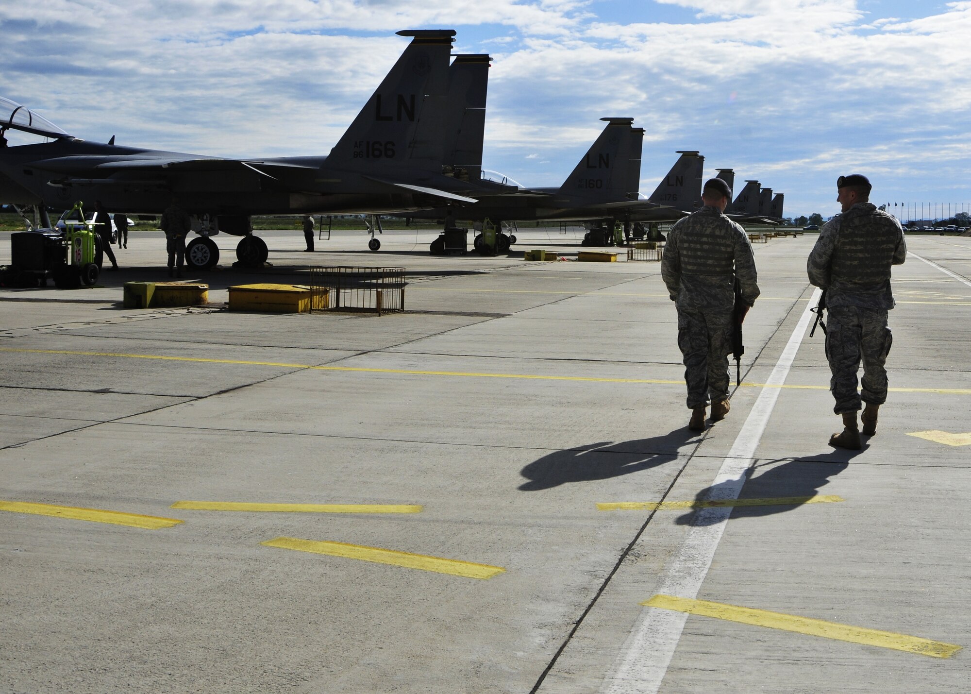 48th Security Forces Squadron patrolmen Senior Airman Sean Gallant and Airman 1st Class Thomas Brockman patrol the flightline for suspicious activity at Graf Ignatievo Air Base, Bulgaria, May 18. 48 SFS Airmen are here to ensure that the joint-training exercise to integrate the Bulgarian air force into NATO is successful. (U.S. Air Force photo/Airman 1st Class Tiffany M. Deuel)