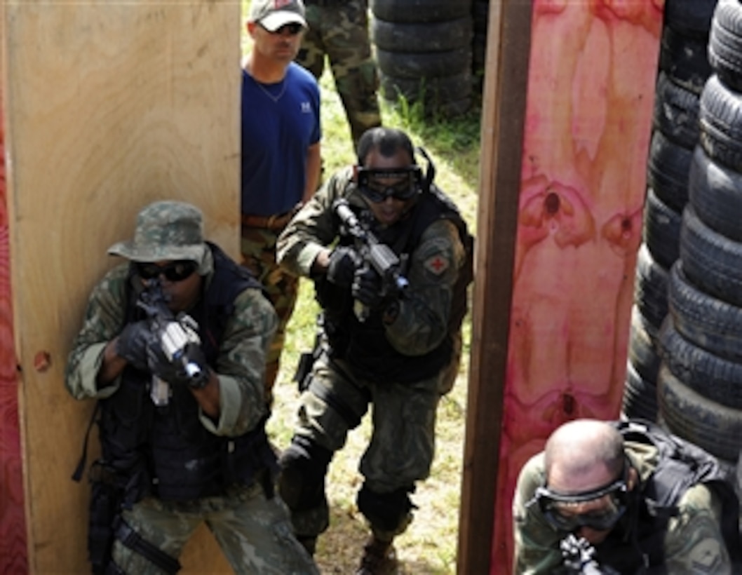 U.S. Navy SEALs train members of the Brazilian Marine Corps Special Operations Battalion (Tonelero) in close quarters combat during a joint combined exchange training exercise in Brazil on May 10, 2010.  