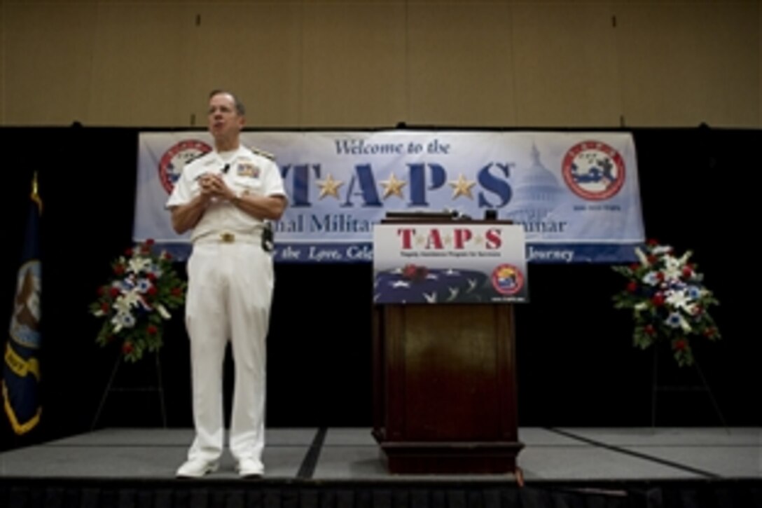 U.S. Navy Adm. Mike Mullen, chairman of the Joint Chiefs of Staff, addresses attendees of the Tragedy Assistance Program for Survivors Military Survivor Seminar and Good Grief Camp opening in Crystal City, Va., May 28, 2010. The sessions provide information to spouses and children of fallen servicemembers to help them heal and cope with life after loss. 