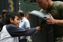 U.S. Marines with Special Marine Ground Task Force demonstrated the Marine Corps Martial Arts Program as well as displayed weaponry in support of Fleet Week New York City 2010.  More than 3,000 Marines, Sailors and Coast Guardsmen will be in the area participating in community outreach events and equipment demonstrations. This is the 26th year New York City has hosted the sea services for Fleet Week. (U.S. Marine Corps photo by Cpl. Patrick P. Evenson)