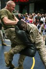 U.S. Marines with Special Marine Ground Task Force demonstrated the Marine Corps Martial Arts Program as well as displayed weaponry in support of Fleet Week New York City 2010.  More than 3,000 Marines, Sailors and Coast Guardsmen will be in the area participating in community outreach events and equipment demonstrations. This is the 26th year New York City has hosted the sea services for Fleet Week. (U.S. Marine Corps photo by Cpl. Patrick P. Evenson)