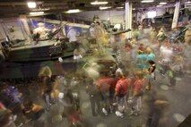 NEW YORK -- Visitors on USS Iwo Jima explore Marine Corps vehicles on display, here, May 29, 2010.   More than 3,000 Marines, Sailors and Coast Guardsmen are in the area participating in community outreach events and equipment demonstrations. This is the 26th year New York City has hosted the sea services for Fleet Week. (Official Marine Corps photo by Sgt. Randall A. Clinton / RELEASED)