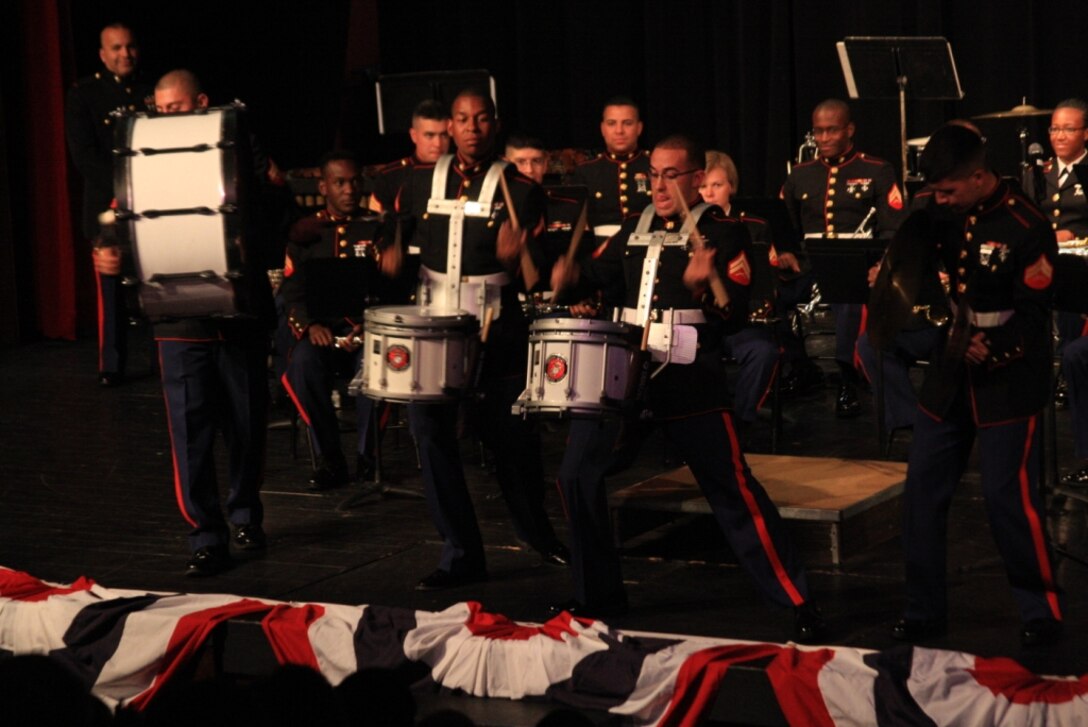 Percussionists with the Combat Center Band perform for a lively audience in Reedsport, Ore., May 30.