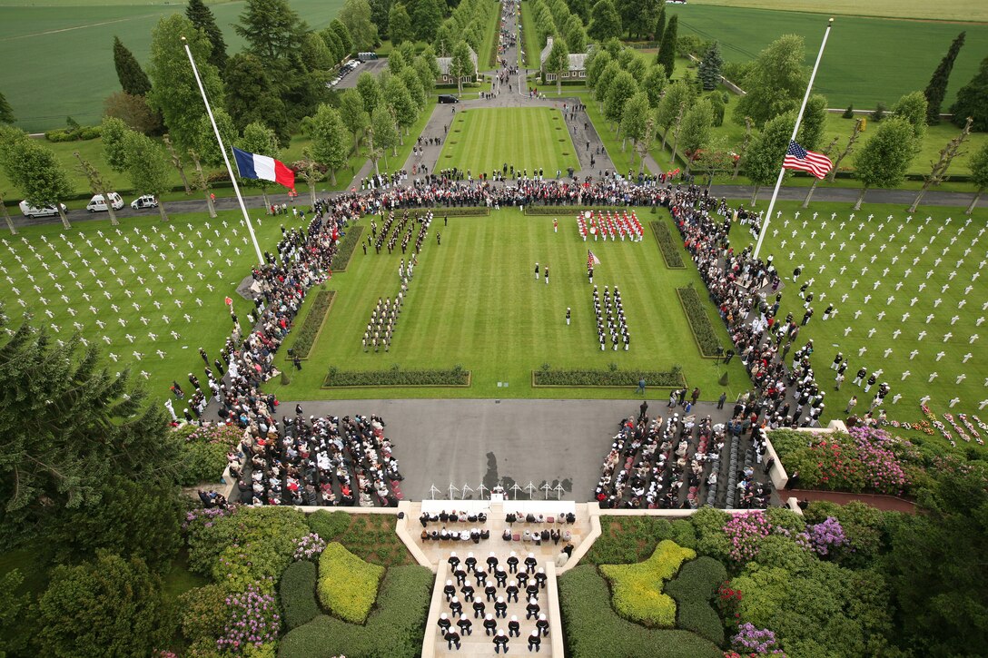 U.S. Marines and French soldiers gather on the parade field of the Aisne-Marne American Cemetery during a Memorial Day service in honor of the 93rd anniversary of the Battle for Belleau Wood. This year's ceremony marks the first time in 93 years that the Marines of the 5th and 6th Marine Regiments have returned to the battlefield together to honor their fallen comrades. More than 1,800 Marines from the 5th and 6th Regiments lost their lives in the 21-day battle that stopped the last German offensive in 1918.
