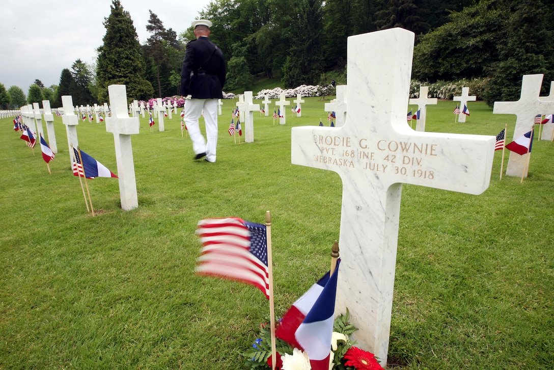 A Marine walks through the Aisne-Marne American Cemetery following a Memorial Day service commemorating the 93rd anniversary of the Battle of Belleau Wood. This year's ceremony marks the first time in 93 years that the Marines of the 5th and 6th Marine Regiments have returned to the battlefield together to honor their fallen comrades. More than 1,800 Marines from the 5th and 6th Regiments lost their lives in the 21-day battle that stopped the last German offensive in 1918.