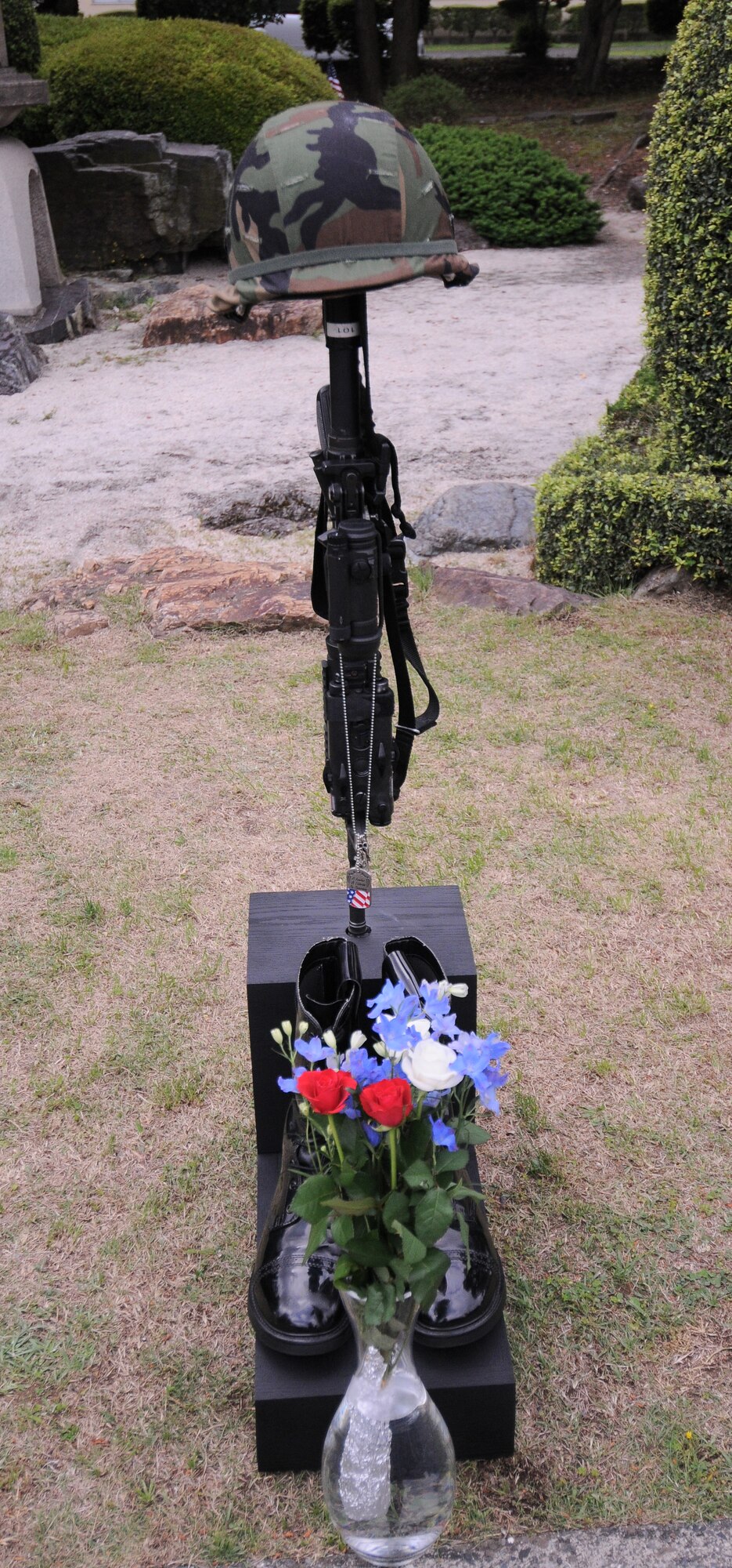 YOKOTA AIR BASE, Japan -- A memorial stands in the gardens at the Officer's Club here May 31. Memorial Day is observed on the last Monday of May and was designated to pay tribute to U.S. men and women who died while serving their country. Yokota's American Legion post 2222 holds the ceremony every year to carry on the tradition which first took place at Arlington National Cemetery in 1868. (U.S. Air Force photo/Airman 1st Class Lynsie Lorenz)