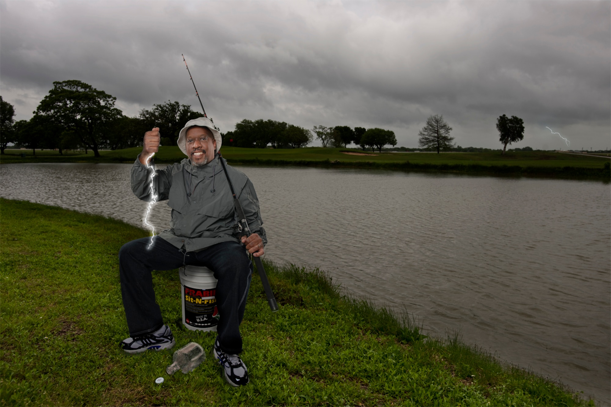 Lightning in a Bottle - "A bad day fishing is better than a good day at work!" trumpets a jovial Melvin L. Clemmons Jr. to all who will listen. But Mother Nature put that theory to the test one summer day in Alabama when lightning struck the avid angler. (Photo composite by Steve Thurow and David M. Stack)

