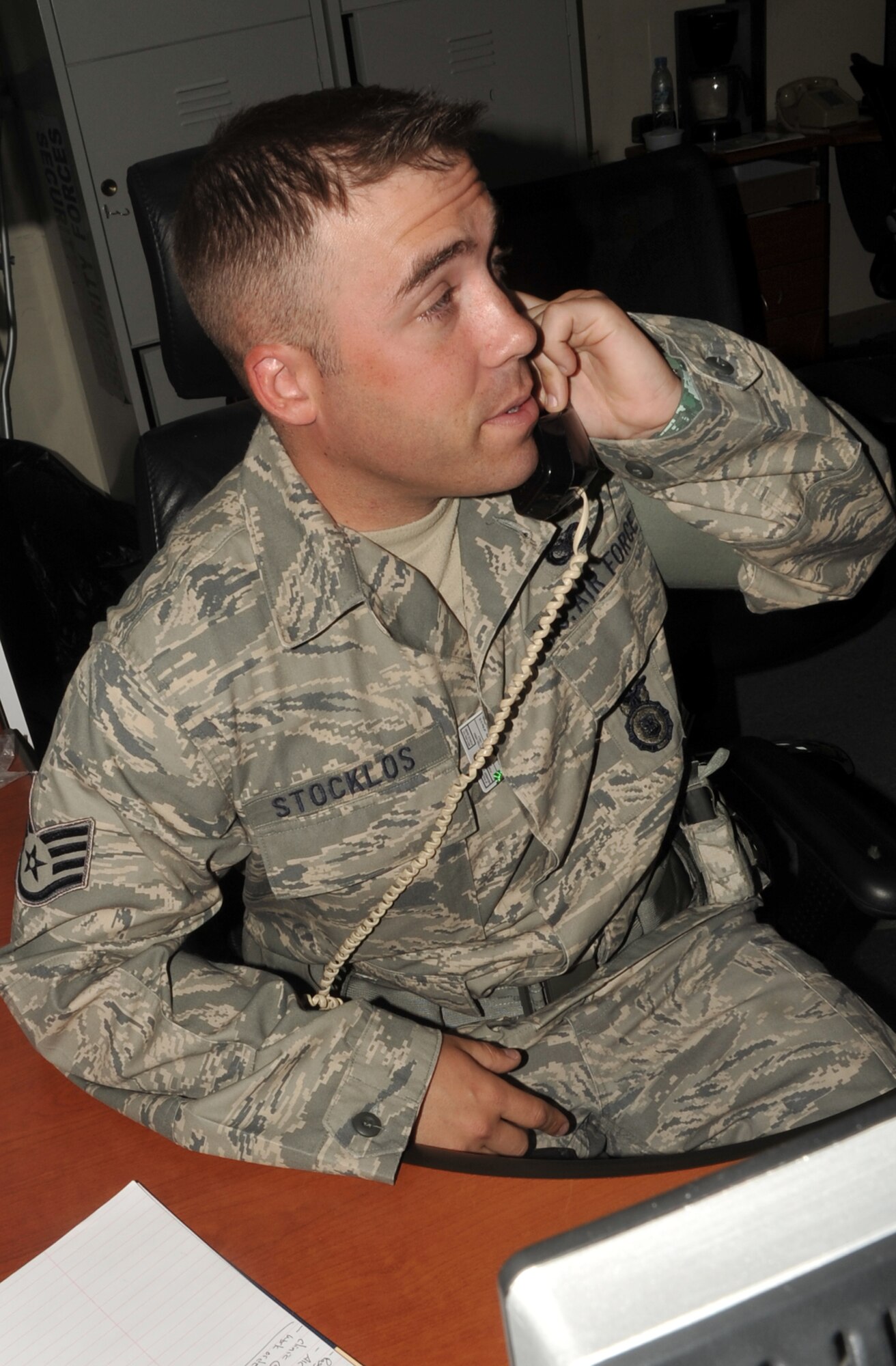 Staff Sgt. James Stocklos, security forces craftsman with the 380th Expeditionary Security Forces Squadron, works in security forces operations area at a non-disclosed base in Southwest Asia on May 29, 2010. Sergeant Stocklos is deployed from the 56th Security Forces Squadron at Luke Air Force Base, Ariz., and his hometown is Malaga, N.J. (U.S. Air Force Photo/Master Sgt. Scott T. Sturkol)