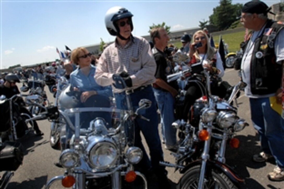 Retired Air Force Gen. Richard B. Myers, former chairman of the Joint Chiefs of Staff, and his wife Mary Jo, get ready for the start of the annual Rolling Thunder Memorial Day weekend ride in the north parking lot of the Pentagon, May 30, 2010. Myers helped lead the ride which begins at the Pentagon and travels to the Vietnam Veterans Memorial in downtown Washington, D.C. 