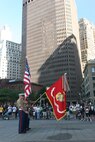 The color guard for 8th Marine Regiment, 2nd Marine Division, presents the national colors during the singing of the National Anthem before the 2010 Big Apple Run for the Warrior race.  More than 130 participants raced along the southern tip of Manhattan in support of wounded warriors.