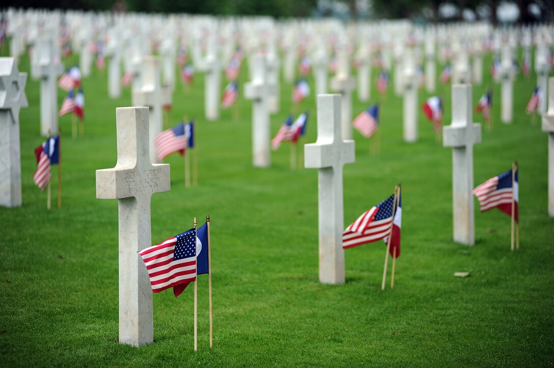 American and French flags mark the graves of services members killed during World War I during the 92nd anniversary of the Battle of Belleau Wood May 30. There are 2,289 Americans buried at the Aisne-Marne American Cemetery in Belleau, France.  (Photo by Cpl. Bobby J. Yarbrough)