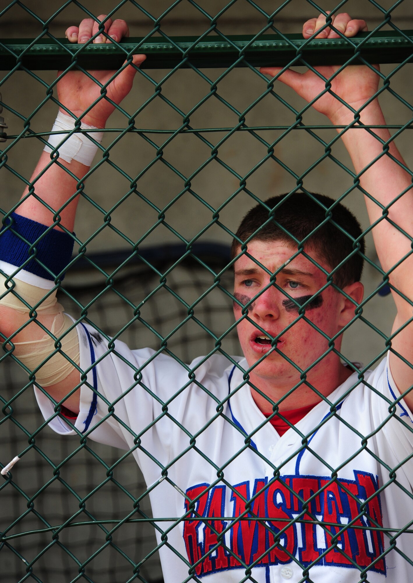 Shane Foley, a member of the Ramstein Royals High School Baseball team, reacts to the Royals defeat in the final inning of the Department of Defense Dependent Schools Europe Baseball European Championships Ramstein Air Base, Germany, May 29, 2010. The three-day championships consisted of high school teams from all over the European theater in Divisions I, II and III. (U.S. Air Force photo by Staff Sgt. Jocelyn Rich)