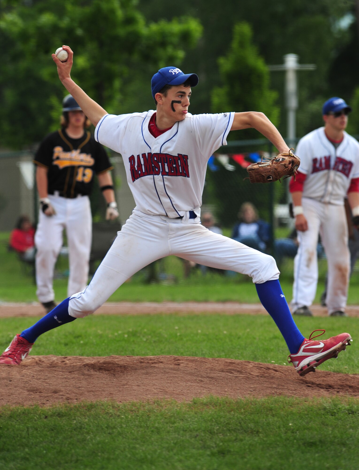 Tyler Breed, pitcher for the Ramstein Royals High School baseball team, launches a pitch to a member of the Patch Barracks High School baseball team during their final game in the Department of Defense Dependent Schools Europe Baseball European Championships, Ramstein Air Base, Germany, May 29, 2010. The three-day championships consisted of high school teams from all over the European theater in Divisions I, II and III. (U.S. Air Force photo by Staff Sgt. Jocelyn Rich)